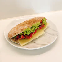 a plate with a sandwich on it