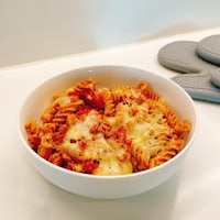a bowl of pasta on a counter
