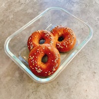three bagels in a clear container