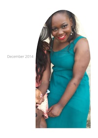 a woman is holding a baby in her arms