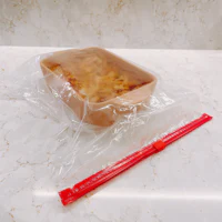 a plastic bag with a food in it