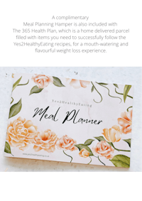 a meal planner with flowers on it
