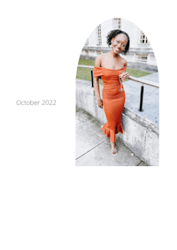 a woman in an orange dress is posing for a photo